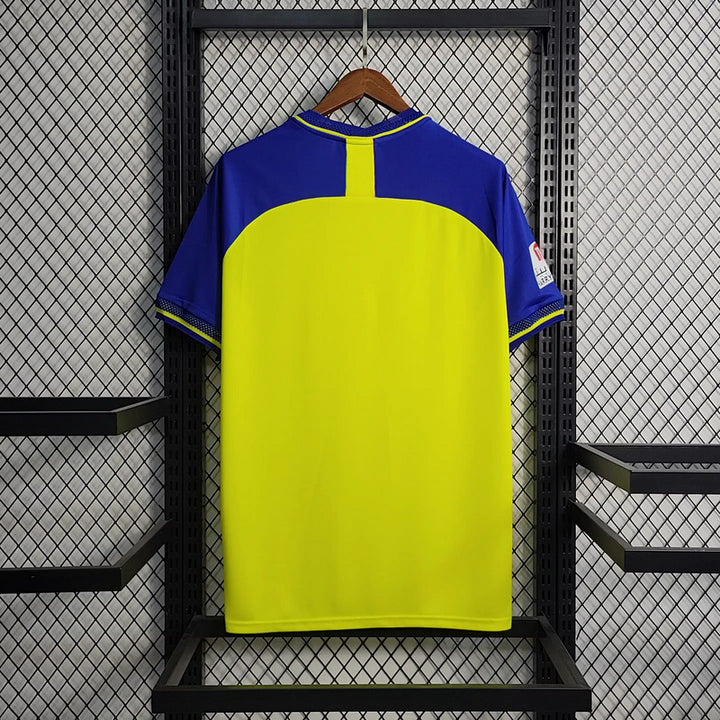 Camisa Al Nassr Home 23/24 Torcedor Nike Masculina - Amarelo e Azul